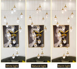 Anjelyn Ebrahim Gold Staircase Chandelier