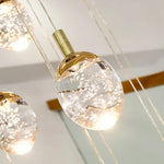 Anjelyn Ebrahim Gold Staircase Chandelier