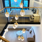 Anjelyn Ebrahim Gold Staircase Chandelier