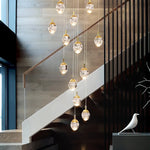 Anjelyn Ebrahim Gold Staircase Chandelier