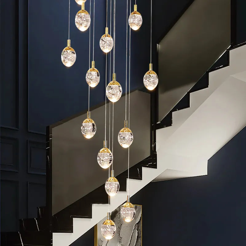 Anjelyn Ebrahim Gold Staircase Chandelier