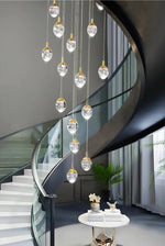 Anjelyn Ebrahim Gold Staircase Chandelier