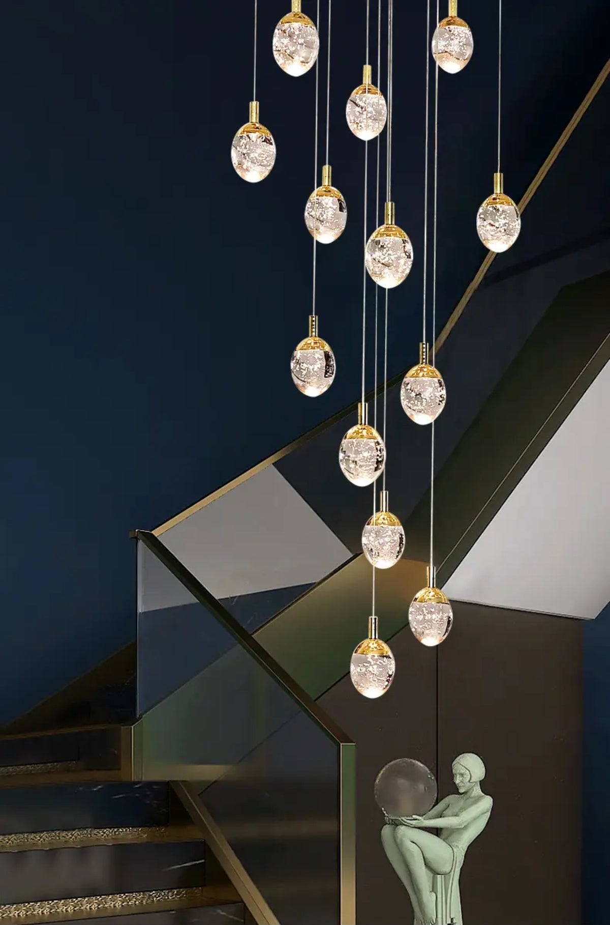 Anjelyn Ebrahim Gold Staircase Chandelier