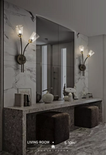 Daguiar Wall Light: Gold/Black - Reflect Lighting