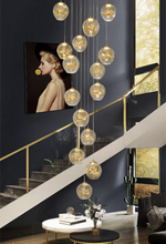 Cognac Eucalyptus Flower Crystal Staircase Chandelier - Reflect Lighting