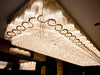 A Grand 4 × 1.5m Bespoke Crystal Chandelier